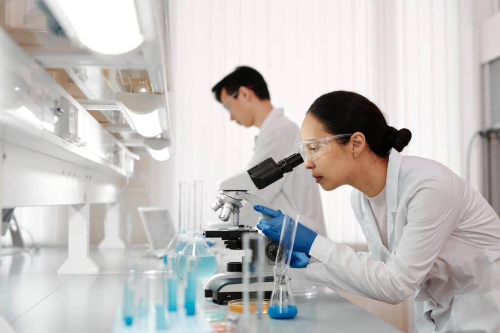 people working in a lab - Lab work and testing in Direct Primary Care