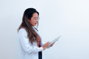doctor holding clipboard - best direct primary care for young adults