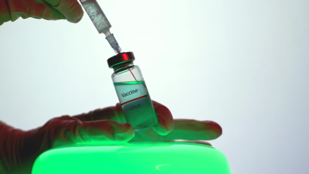 vaccine and syringe