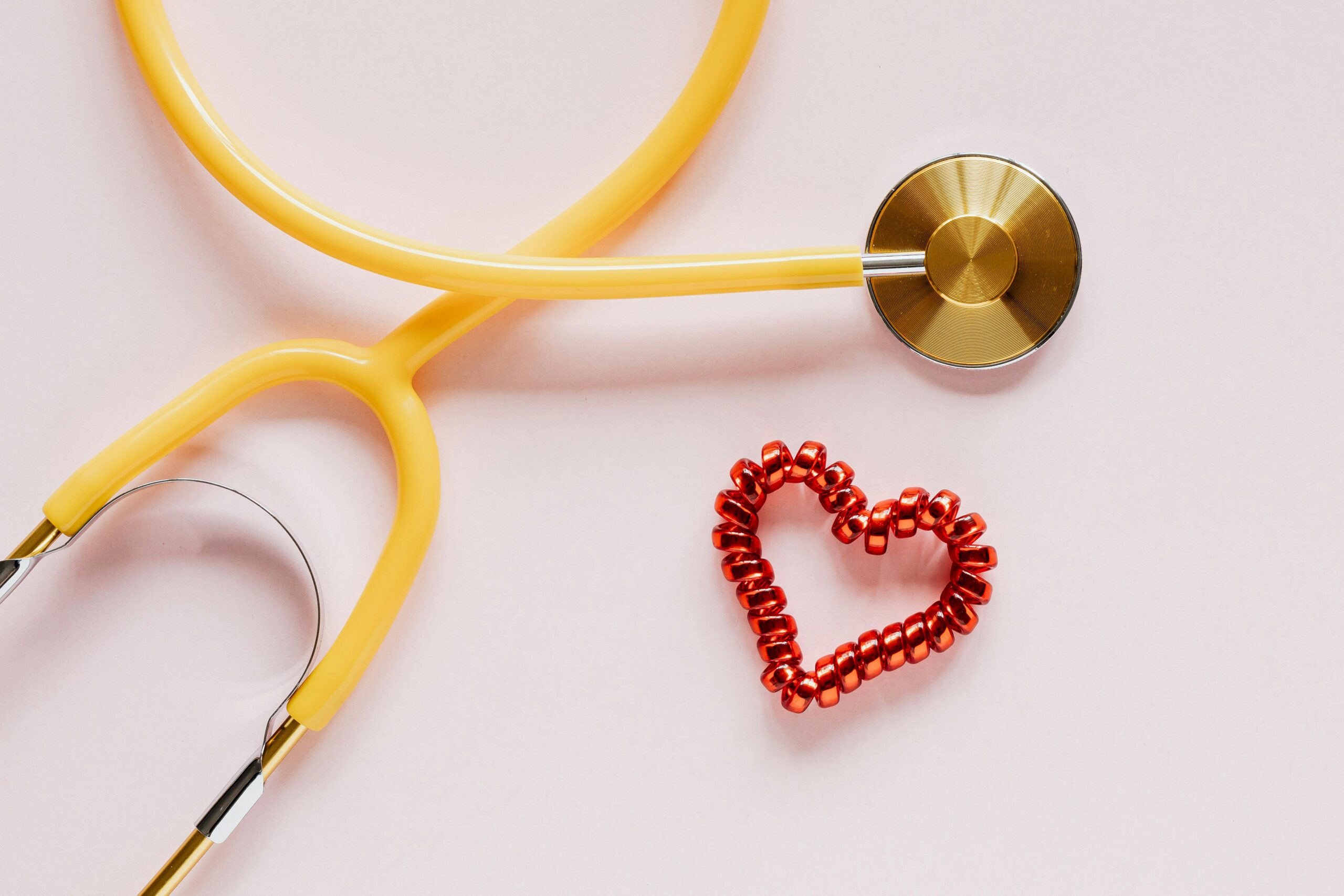 stethoscope and heart-shaped hair tie